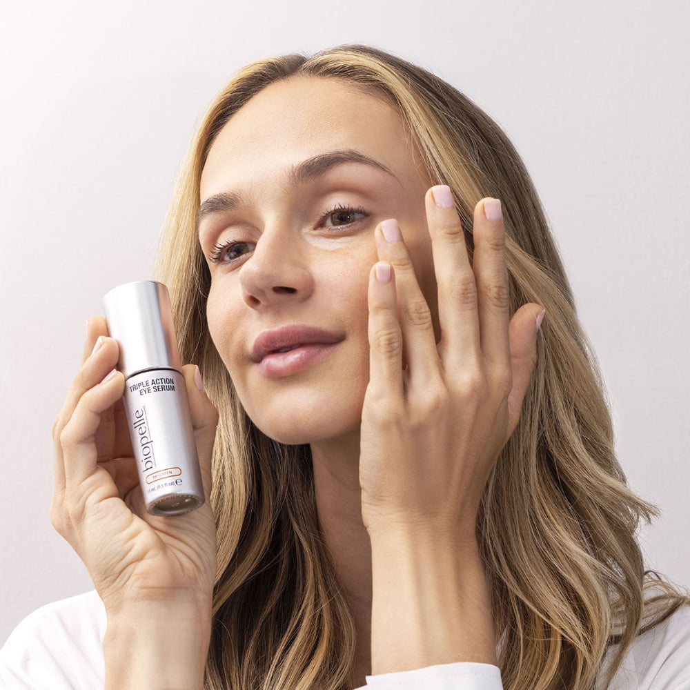 Woman with Biopelle Brighten Triple Action Eye Serum