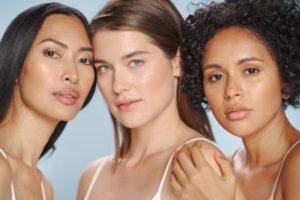 Clean faces image of three diverse women